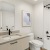 bathroom with a tub, sink and toilet