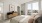 bedroom with a dresser, bedroom, and windows